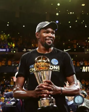 Kevin Durant with the 2017 NBA Championship MVP Trophy Game 5 of the 2017 NBA Finals